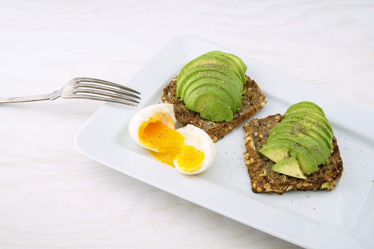 Double-click to save image, or right-click for 'Save image as...' High-Fiber Breakfast Without Eggs (Easy Chickpea Avocado Toast) finished dish and serving presentation