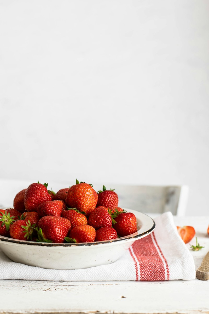 Refreshing Strawberry Hibiscus Mocktail with Fresh Mint ingredients and preparation setup